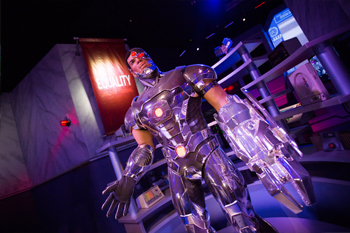 Interactive dark ride Justice League: Battle For Metropolis 4D building interior animatronic DC comic character Cyborg queue line at Six Flags Theme Parks, U.S.A.