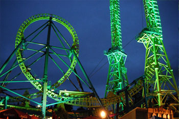 Goliath Coaster Thrill Ride illuminated at night with vibrant white color by Studio Due CityColor 2000 architecural lighting fixture, Six Flags New England - Agawam, Massachusetts, USA
